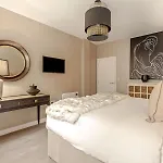 The Sloane At Signature Suites
